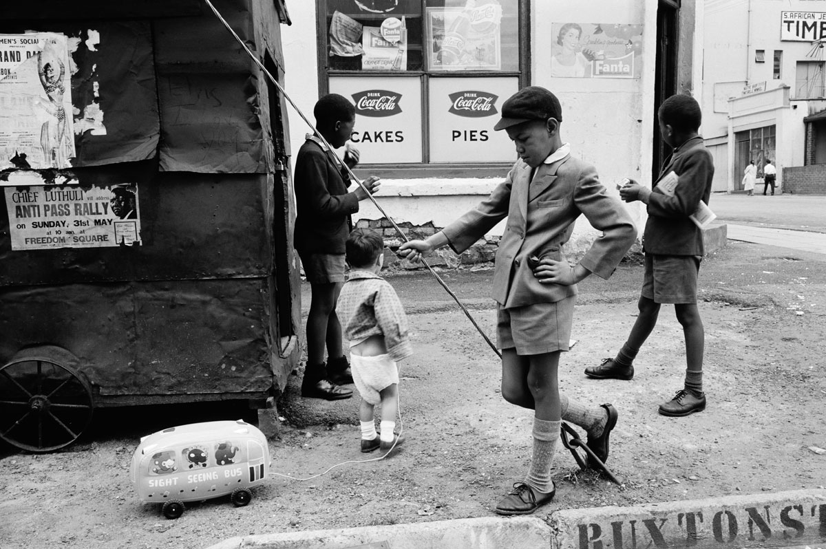 Steven with Sight Seeing Bus, Doornfontein, Johannesburg, 1960 — David Goldblatt
