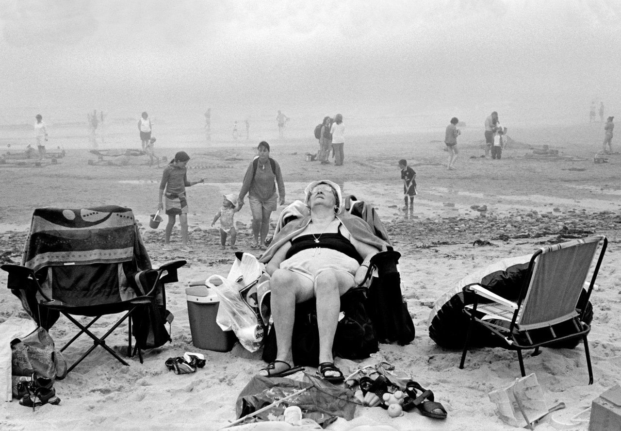 Enjoying the Beach, Porth Oer (Whistling Sands), Wales, 2004 — David Hurn