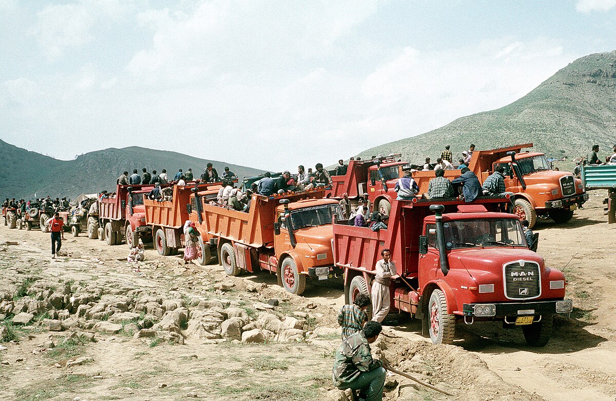 Kurdish refugees travelling by truck near the Turkey-Iraq border, 1991