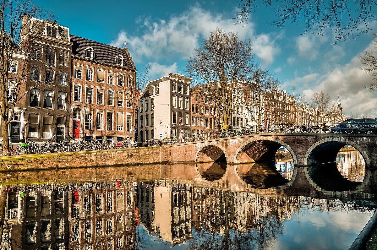 Colourful Amsterdam canal houses — the everyday Dutch scenes central to Aarsman's documentary eye