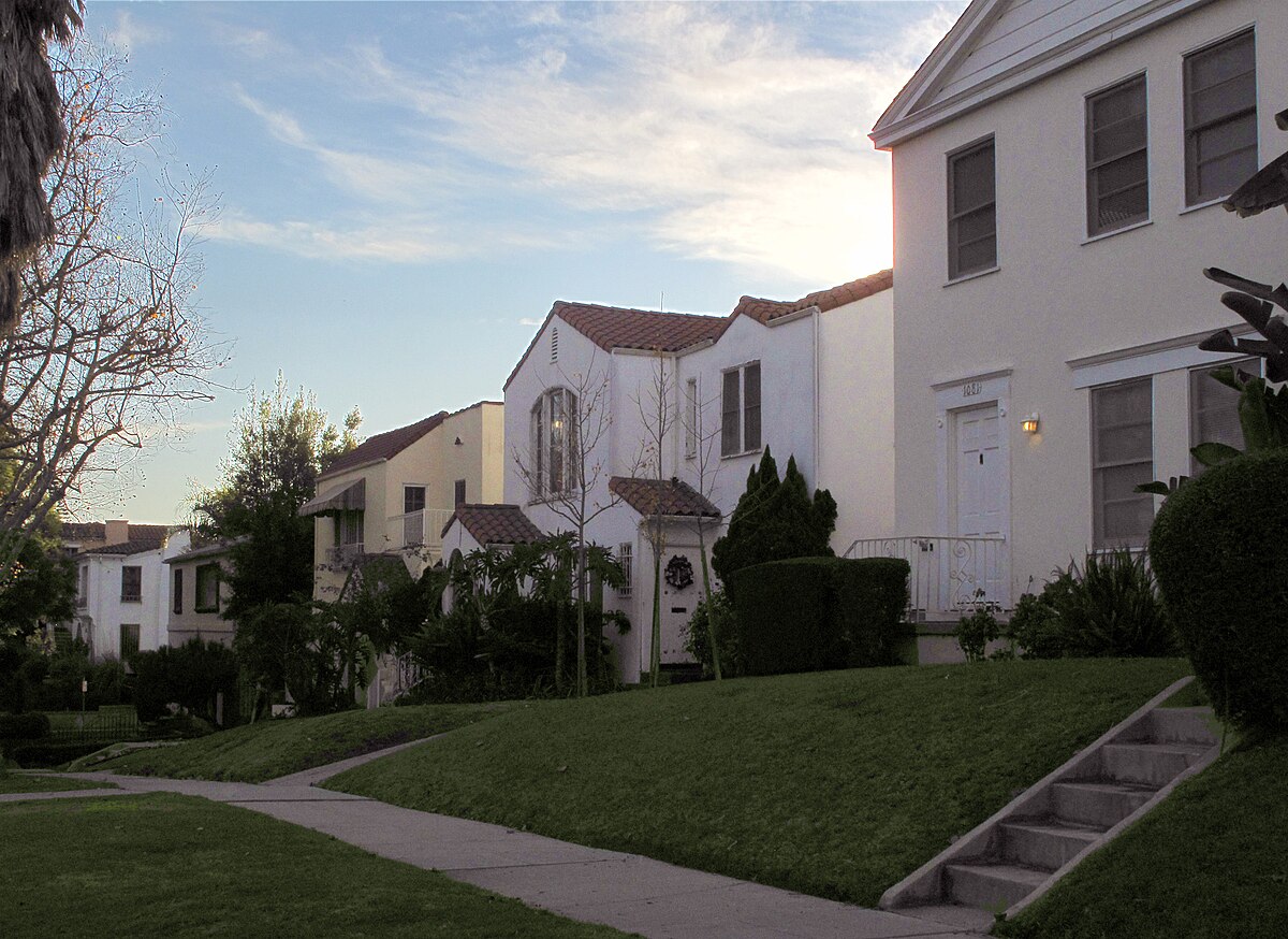 Pastel stucco houses with red tile roofs in the Miracle Mile area of Los Angeles, California
