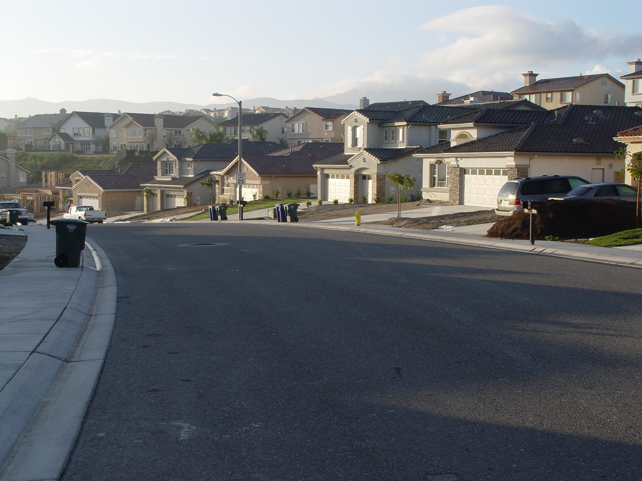 Typical suburban street in Thousand Oaks, California with trees and houses