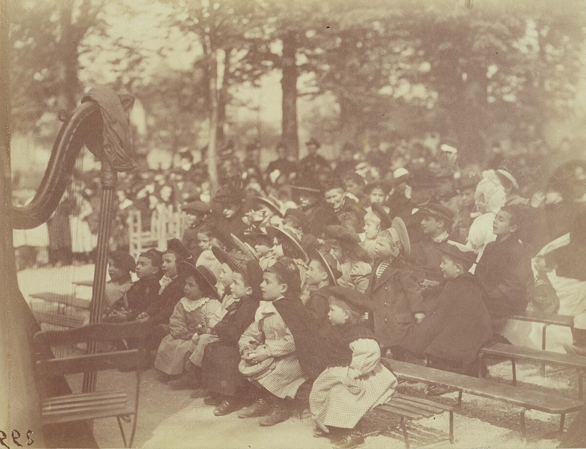 Children including Jacques Henri Lartigue and his brother Zissou watching a Guignol puppet show, Jardin du Luxembourg