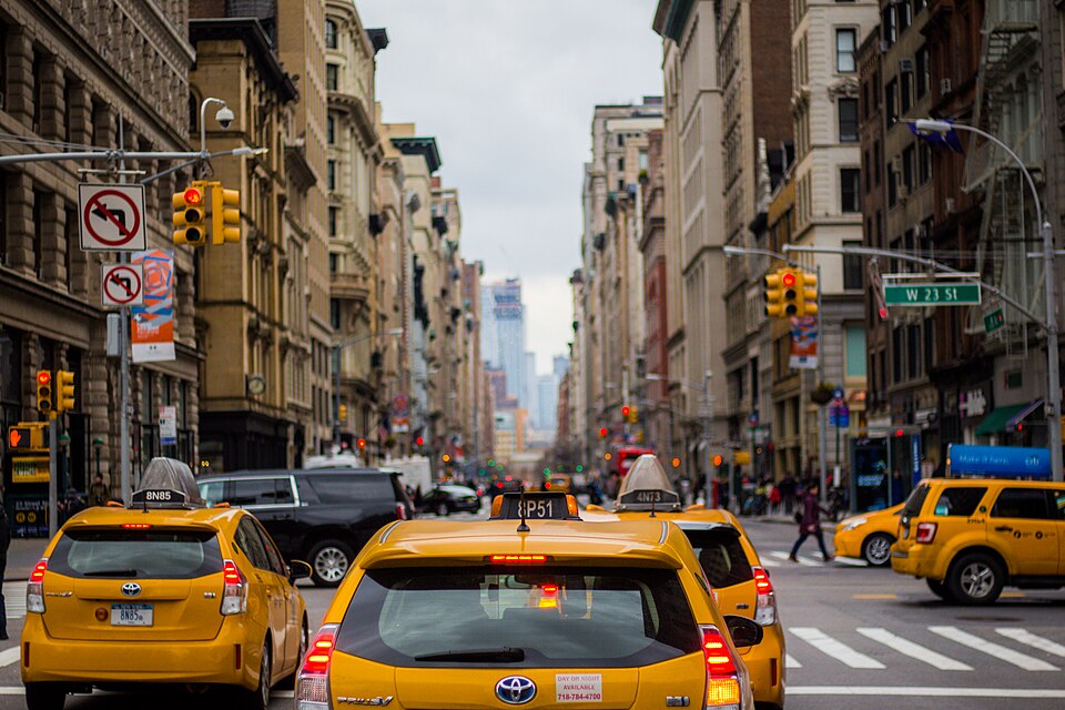 Yellow taxi cabs on a busy New York City street