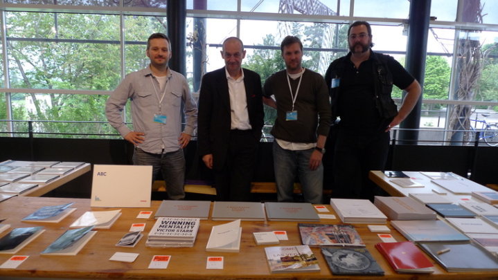 Joachim Schmid with Mishka Henner, Andreas Schmidt and Robert Pufleb at ABC stall, Kassel Fotobuch Festival, 2010