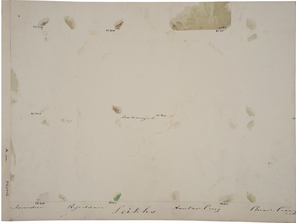 Archival photograph album with empty spaces, evoking themes of memory and displacement