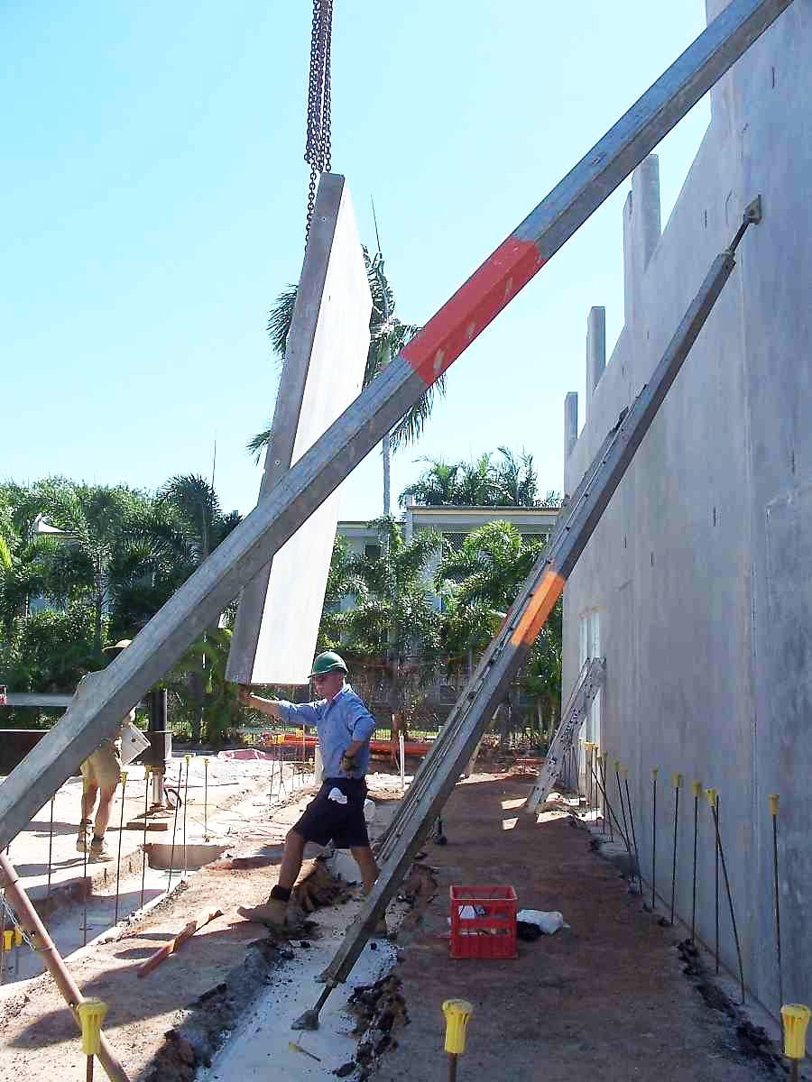 Concrete tilt panel wall detail showing the minimalist geometry of industrial building surfaces