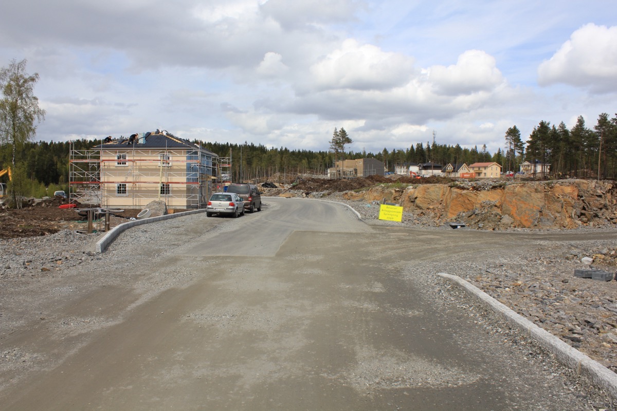Suburban housing construction site showing earthworks and new development, reminiscent of Baltz's Park City series
