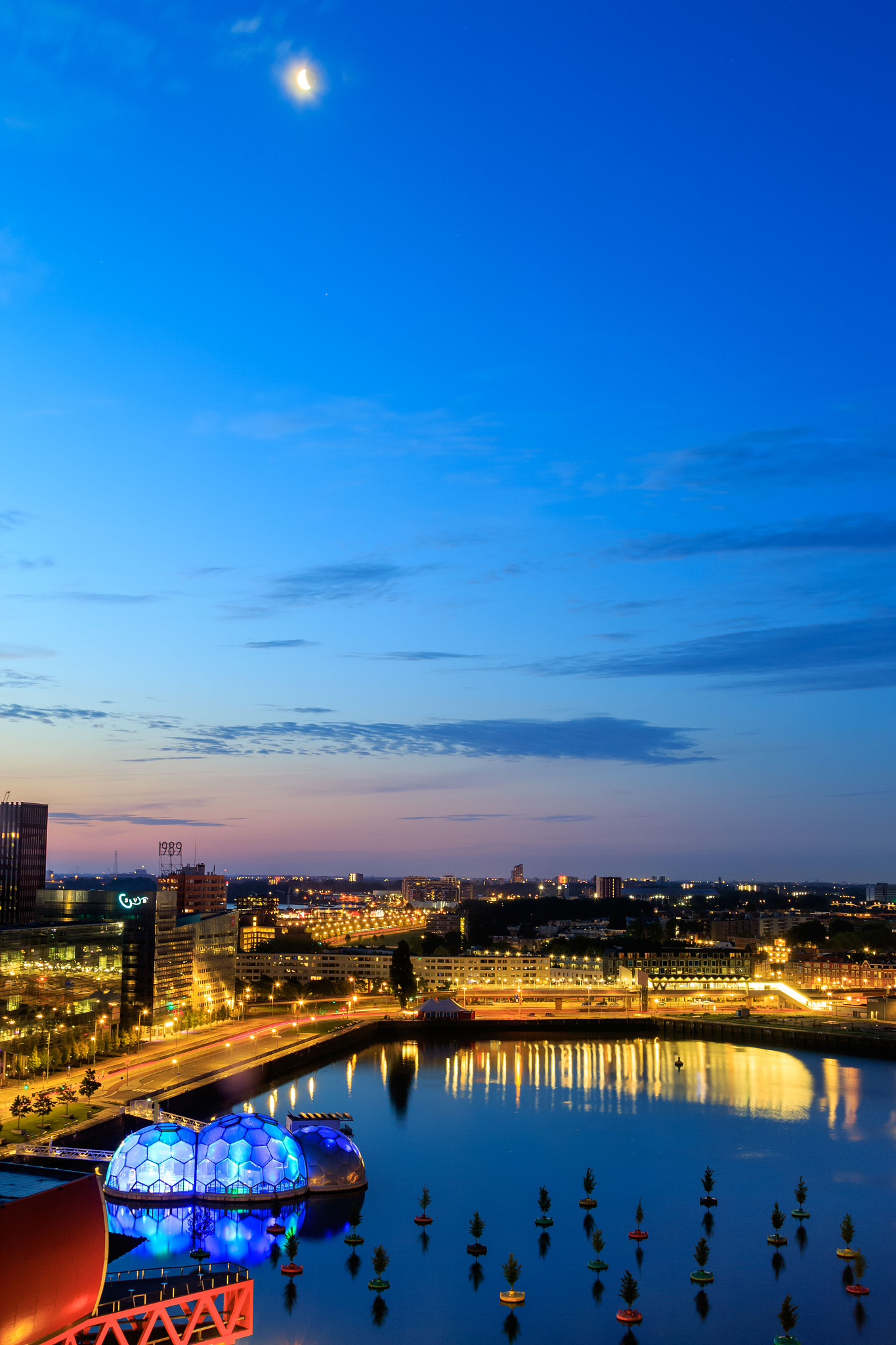 Rotterdam streetscape at dawn, moody urban scene with atmospheric light