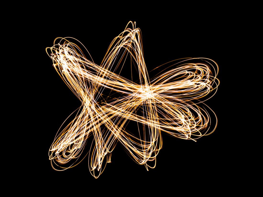 Light traces based on Lissajous figures, evoking Steinert's luminogram experiments with moving light