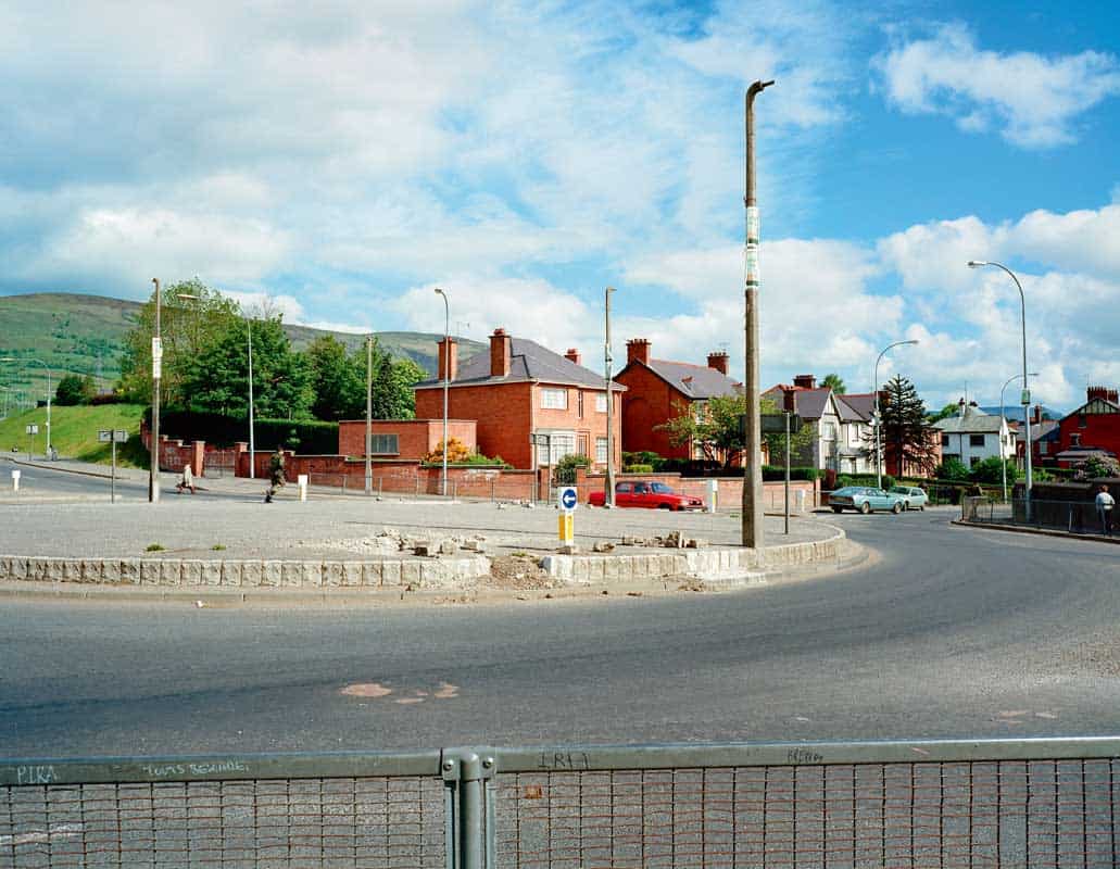Roundabout, Andersonstown, Belfast, From Troubled Land, 1984 — Paul Graham