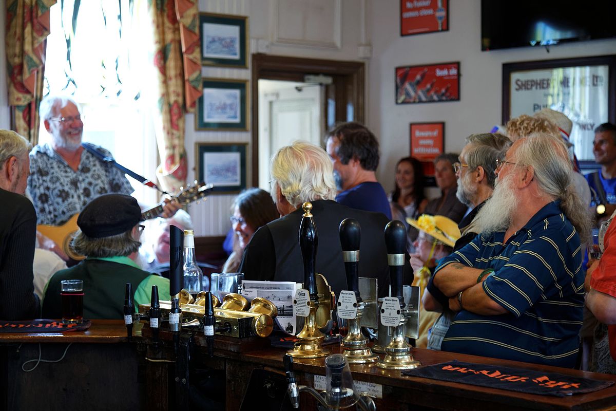 Pub bar entertainment in Kent, England &mdash; evocative of Peter Dench's Drinking Britain series documenting British pub culture