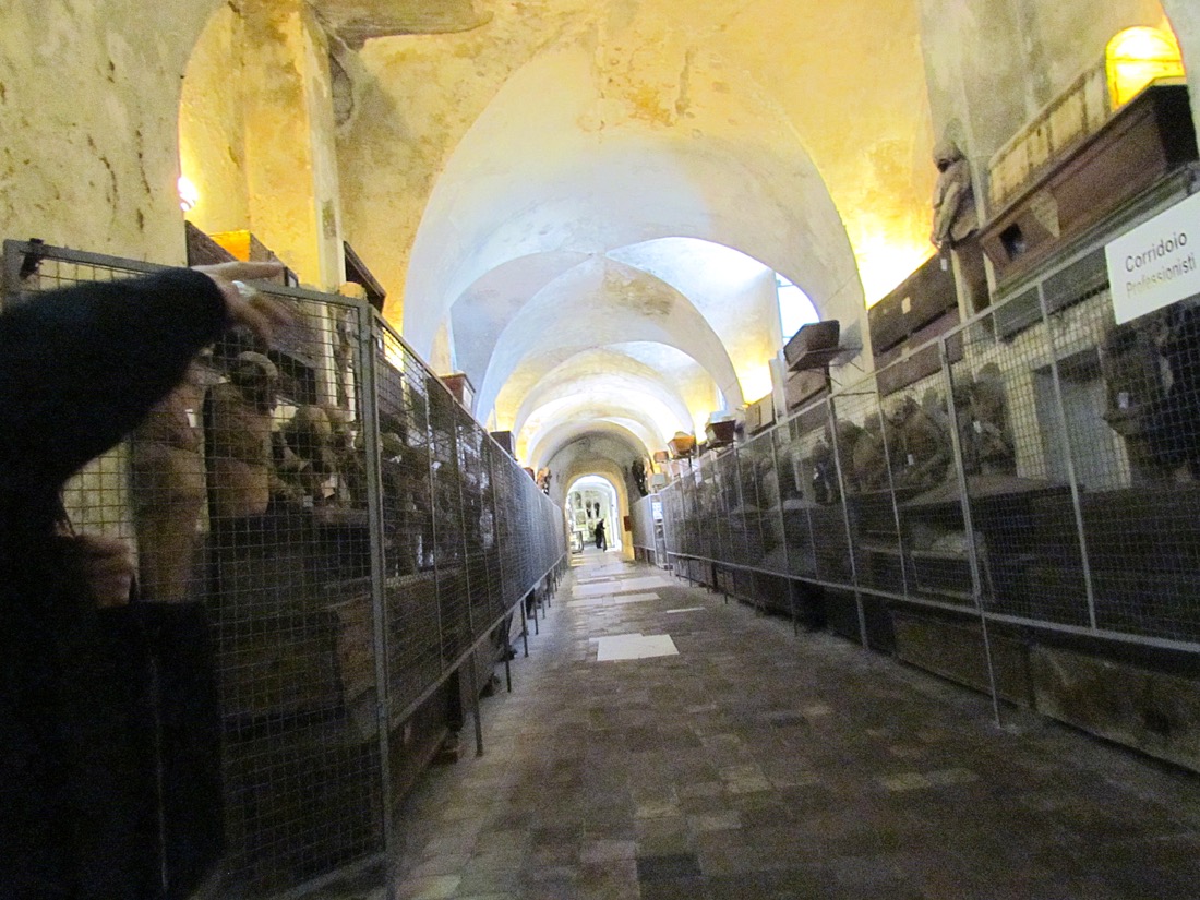 Corridor of the Capuchin Catacombs of Palermo, Sicily, with mummified remains lining the walls