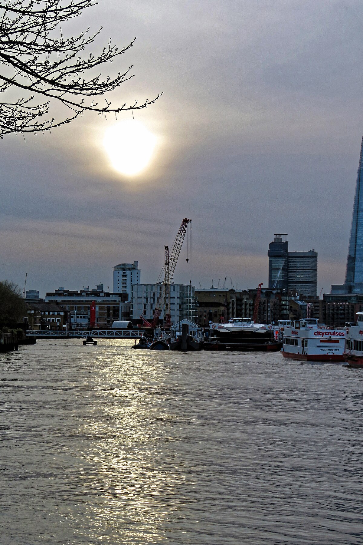 Sun reflection on the surface of the River Thames &mdash; evoking Still Water (The River Thames, for Example)