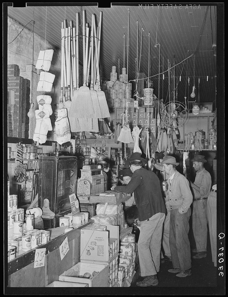 Scene in grocery store, Saturday afternoon, San Augustine, Texas, 1939 — Russell Lee, FSA/LOC