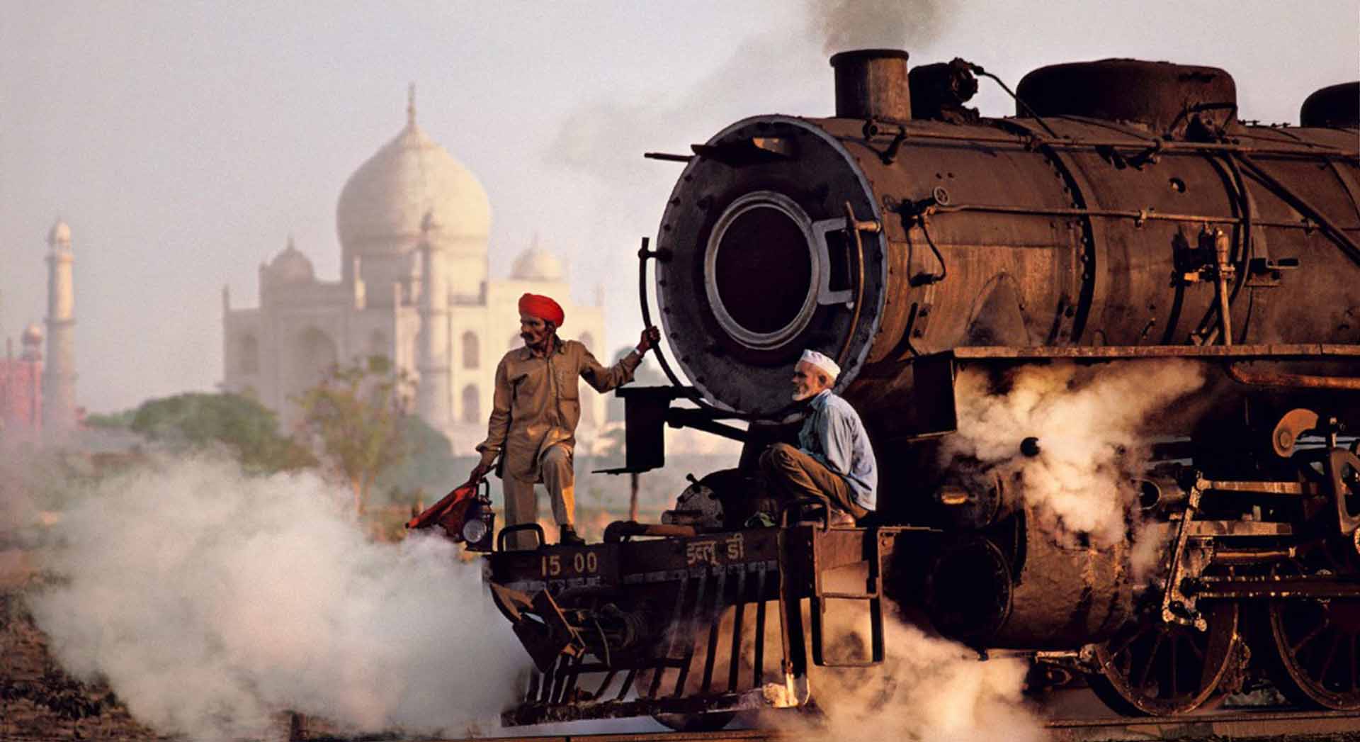 Taj Mahal and Train, Agra, India by Steve McCurry